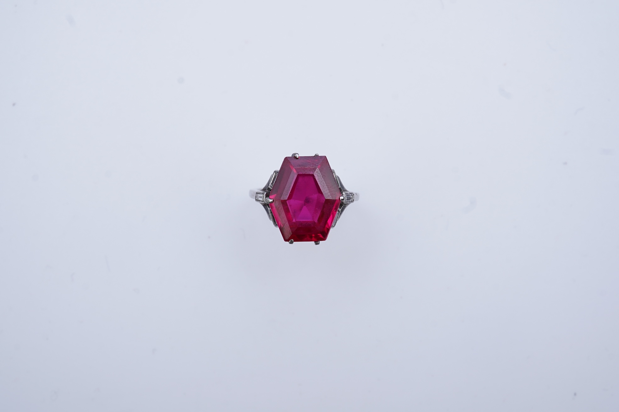 A synthetic ruby and diamond ring